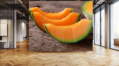 melons sliced Fresh on wooden table Wall mural