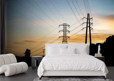 Transmission electrical lines silhouetted against sunset in Los Angeles, CA Wall mural