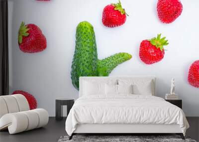 Cucumber and Strawberry Background as Sexual Health Concept Wall mural