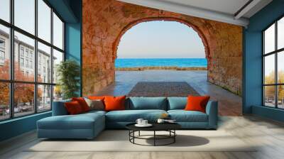 Seascape View Through Archway In Tarragona's Historic Structure Wall mural