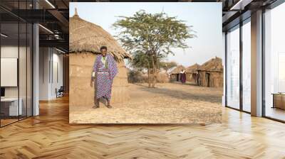 Maasai warrior in a boma Wall mural