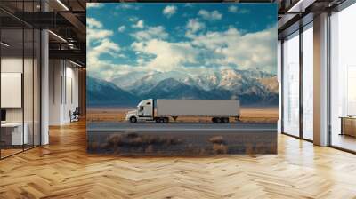 A white cargo truck with a white blank empty trailer for ad on a highway road in the united states. beautiful nature mountains and sky Wall mural