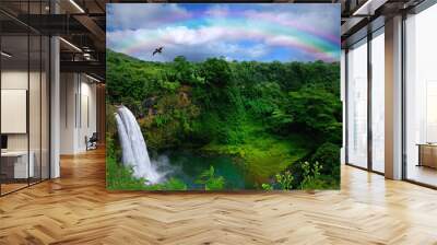 Waterfall in Kauai With Rainbow and Bird Overhead Wall mural