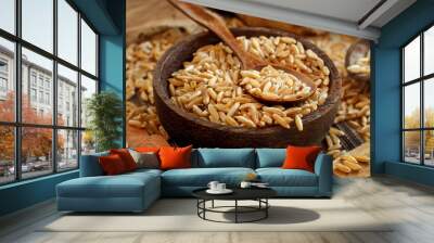 Raw Kamut grain in a wooden bowl Wall mural