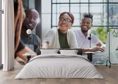 African american hr team welcoming female applicant at job interview Wall mural