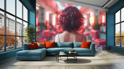 back view of beautiful girl with curly hair in barbershop on blurred background with copy space Wall mural