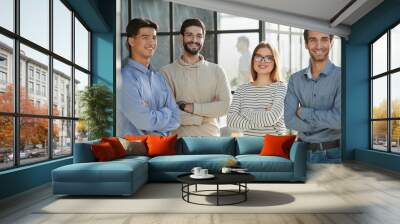 business people standing and looking straight ahead in a modern office Wall mural