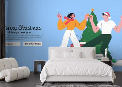 Man and woman dancing near christmas tree and drinking champaign. People celebrate christmas or new year at work, office or having party at home. Creative banner, web page, social media greeting post. Wall mural