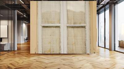 The texture of an old wooden window with curtains. White painted window frame Wall mural