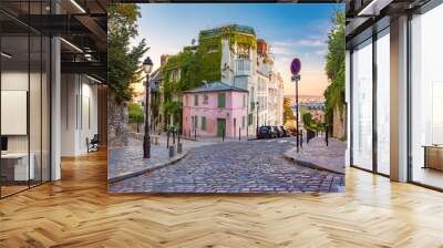 Cozy old street with pink house at the sunny sunrise, quarter Montmartre in Paris, France Wall mural