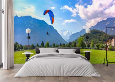 Paraglider in Interlaken, Switzerland Wall mural