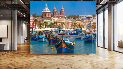 Traditional eyed colorful boats Luzzu in the Harbor of Mediterranean fishing village Marsaxlokk, Malta Wall mural