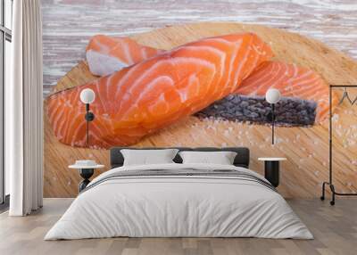 salted red fish on wooden cutting board Wall mural