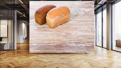 two breads on wooden background Wall mural