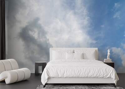 Fluffy white and grey cloudy blue sky Wall mural