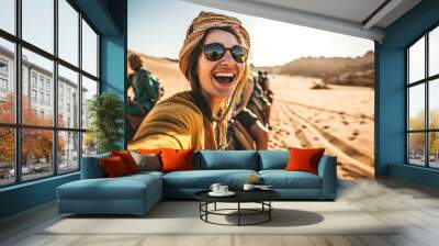 Happy tourist having fun enjoying group camel ride tour in the desert - Travel, vacation activities and adventure concept, Generative AI Wall mural