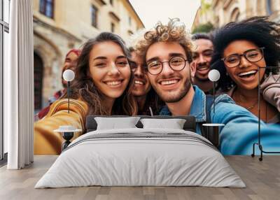 Happy tourists group taking selfie photo walking in european city street - Multiracial young people smiling together at camera outside - University students enjoying day out in college, Generative AI Wall mural