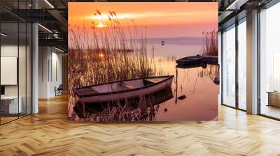 Sunset on the lake Balaton with a boat Wall mural