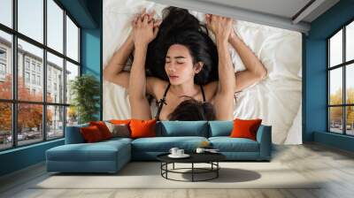 Asian sensual lover man and woman making love on bed in bedroom at home.  Wall mural