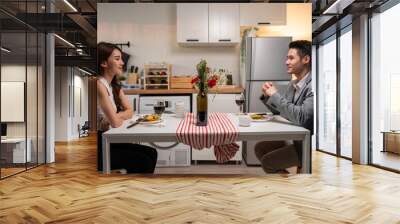 Asian young couple having dinner to celebrate valentine's day together Wall mural