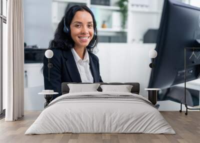 Portrait of Latino beautiful business woman smile while work in office. Wall mural