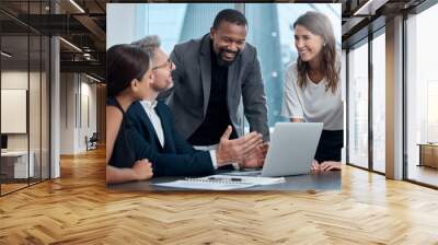 Working on a master plan. Cropped shot of a group of corporate business colleagues having a meeting around the table in the boardroom. Wall mural