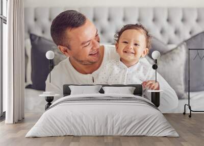 happy father relax with baby in bedroom, family home and house for funny, relax and playful morning  Wall mural