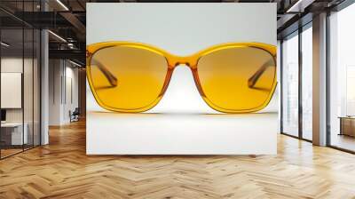 A pair of yellow sunglasses with a black frame  Wall mural