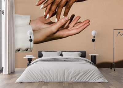 black and white hands reaching towards eachother with shadows Wall mural