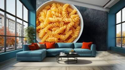 Spiral Pasta in a White Bowl on a Dark Background Wall mural