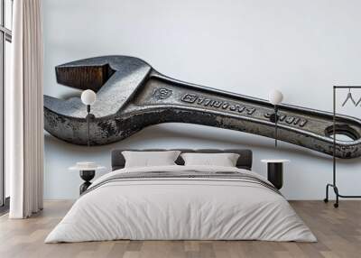 Worn Steel Adjustable Wrench on a White Background Wall mural