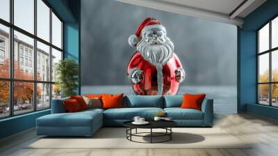 Minimalistic Santa Claus made of glass on a shiny silver background Wall mural