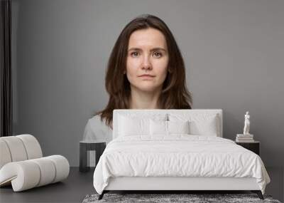 Portrait of a young woman in a white T-shirt. Naturalness. Wall mural