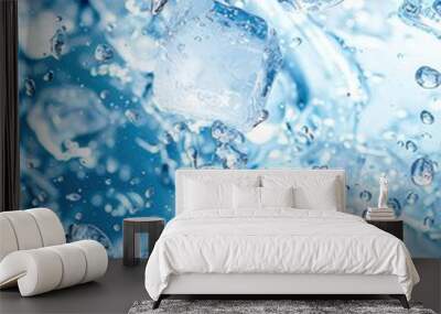 Blue water splash with ice cubes, ample copy space Wall mural