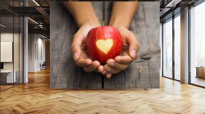 red apple with engraved heart Wall mural