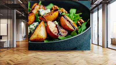 Arugula salad featuring caramelized pear, blue cheese, walnuts, and a balsamic vinegar glaze for fall Wall mural