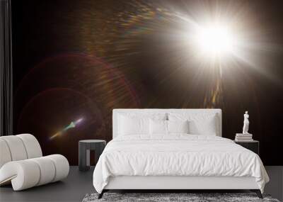 Easy to add lens flare effects for overlay designs or screen blending mode to make high-quality images. Abstract sun burst, digital flare, iridescent glare over black background. Wall mural