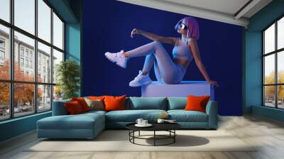 woman in futuristic costume. female in modern vr glasses interacting with network while having virtu Wall mural