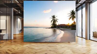 Tropical beach at sunset, with palm trees silhouetted against a vibrant sky. Wall mural