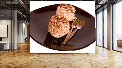 Two Chocolate Meringues on a black plate Wall mural