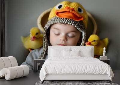 Adorable infant outfit featuring playful rings and a cute ducky theme Wall mural