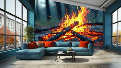 Captivating bonfire illuminating the night with vibrant flames in a serene outdoor environment Wall mural