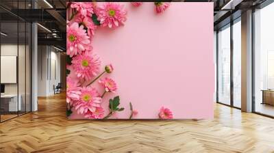 Charming border of pink chrysanthemums on a soft pink background, showcasing a delightful floral pattern with ample copy space for creativity Wall mural