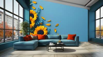 Cheerful sunflower border on vibrant blue backdrop for summer vacation designs and greeting invitations Wall mural