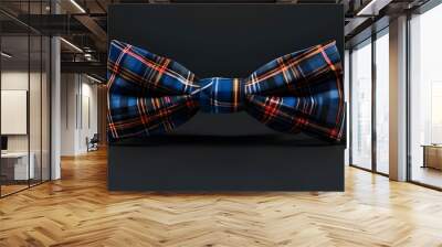 Chic modern bow tie featuring a blue, brown, and red checkered pattern against a sleek black backdrop Wall mural