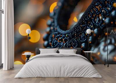 Elegant black beaded necklace surrounded by captivating bokeh lights in a blurred backdrop Wall mural