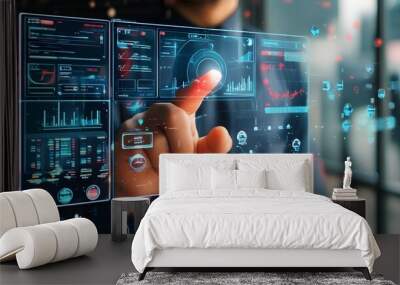 Futuristic hand engaging with dynamic digital interface elements and holographic displays Wall mural