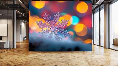 Intricate snowflake close-up amidst vibrant bokeh lights, embodying the spirit of winter and festive celebrations Wall mural