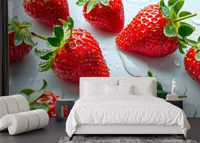 Juicy strawberry adorned with glistening water droplets on a pristine white backdrop, representing summer freshness in healthy food design Wall mural