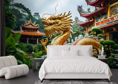 Majestic golden dragon statue in a lush temple garden, embraced by traditional architecture and vibrant greenery Wall mural